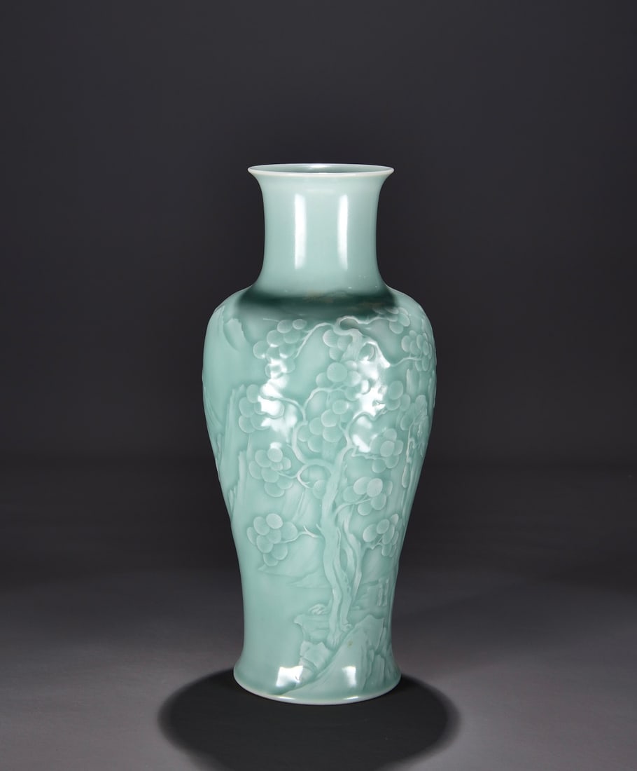 Formerly in the collection of a Qing Dynasty Yongzheng period celadon carved landscape fish-tail: Dimensions: 37cm high, 18cm wide Provenance:Private collection from a professor in Massachusetts Institute of Technology. Our dedicated team expertly handles both domestic and global shipping arrangem