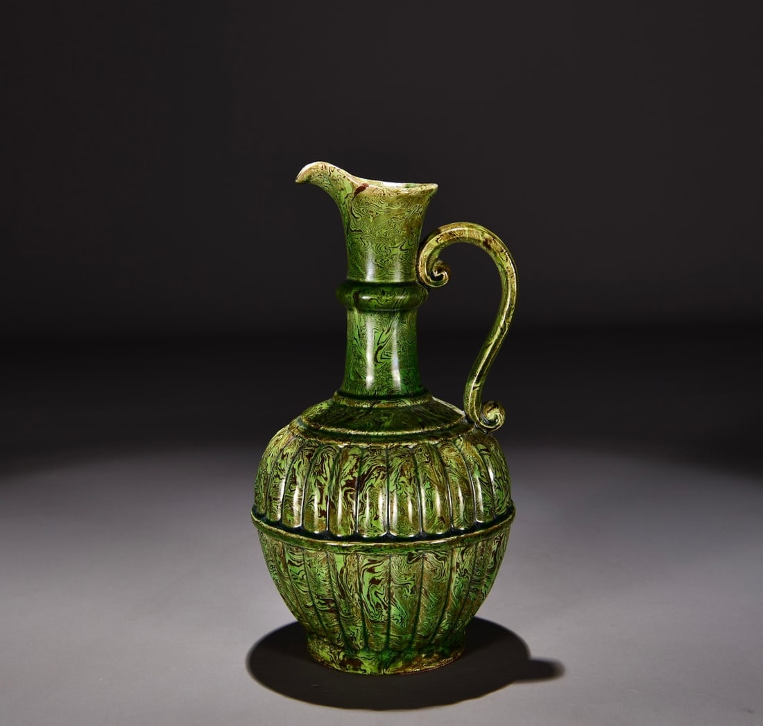 Formerly in the collection of a Song Dynasty Dangyangyu kiln marbled green-glazed ewer (1 of 9)