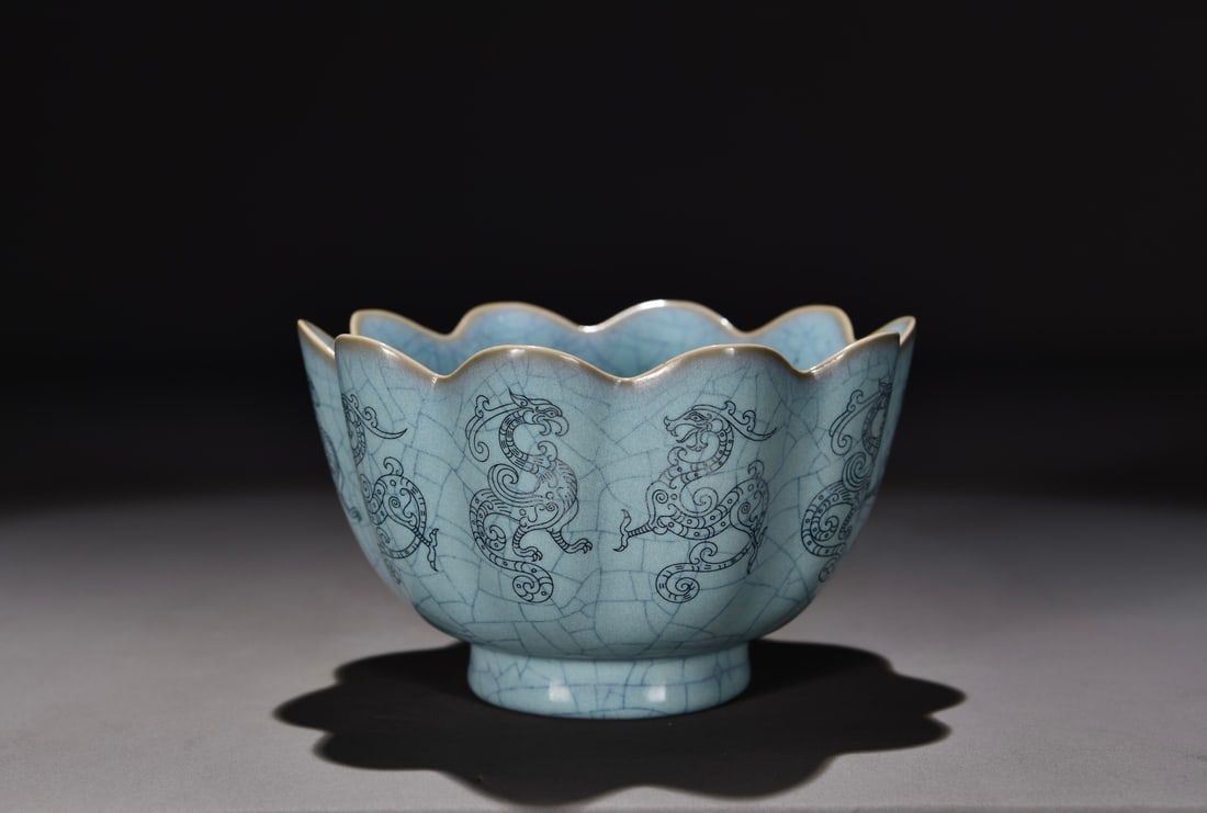 Formerly in my collection, a Song Dynasty Ru ware celadon-glazed bowl inlaid with silver lotus (1 of 9)