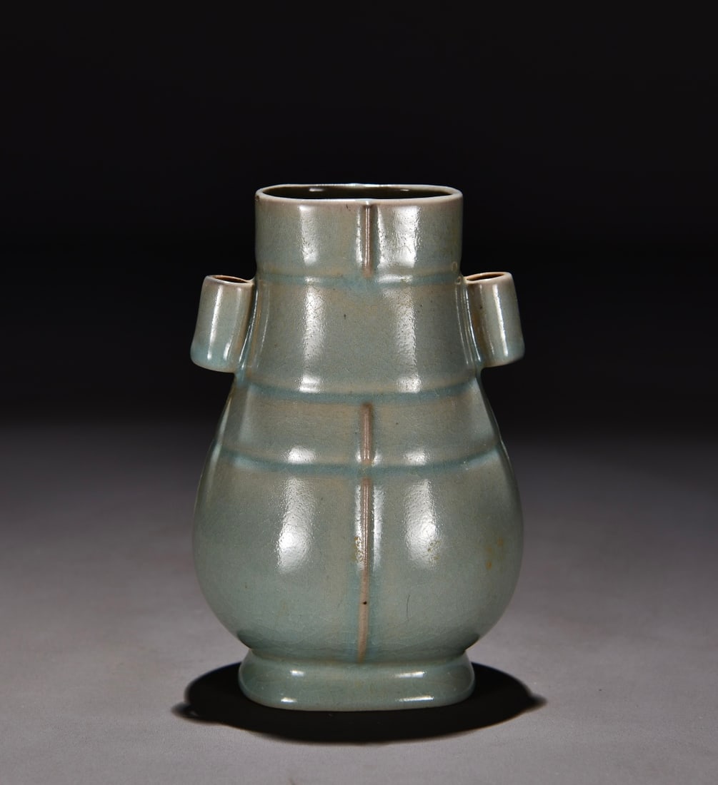 Formerly in the collection of a Song Dynasty Ru ware celadon-glazed vase with rolled handles (1 of 9)