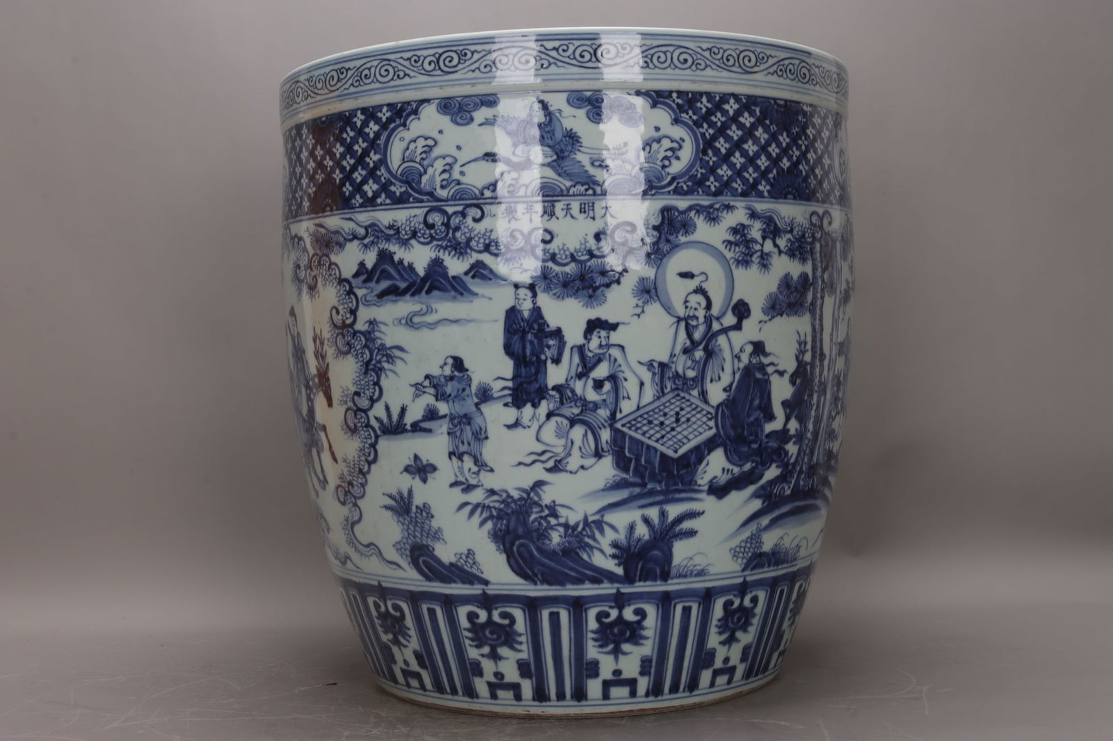 A large blue-and-white porcelain jar with figures and stories from the Tianshun period of the Ming (1 of 9)