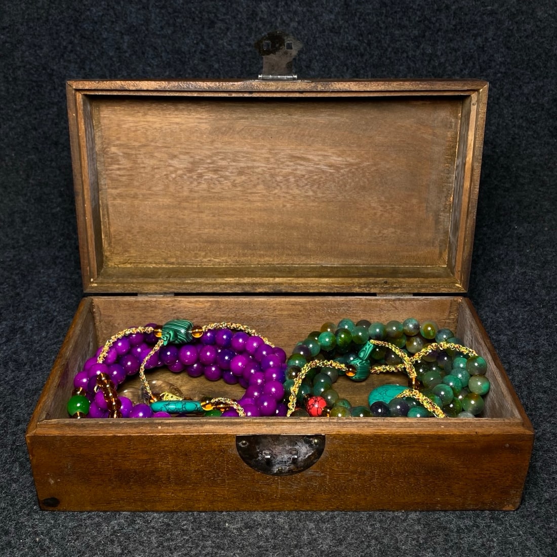 The rosewood painted collection box contains a treasured sugilite court necklace and a jadeite court (1 of 10)