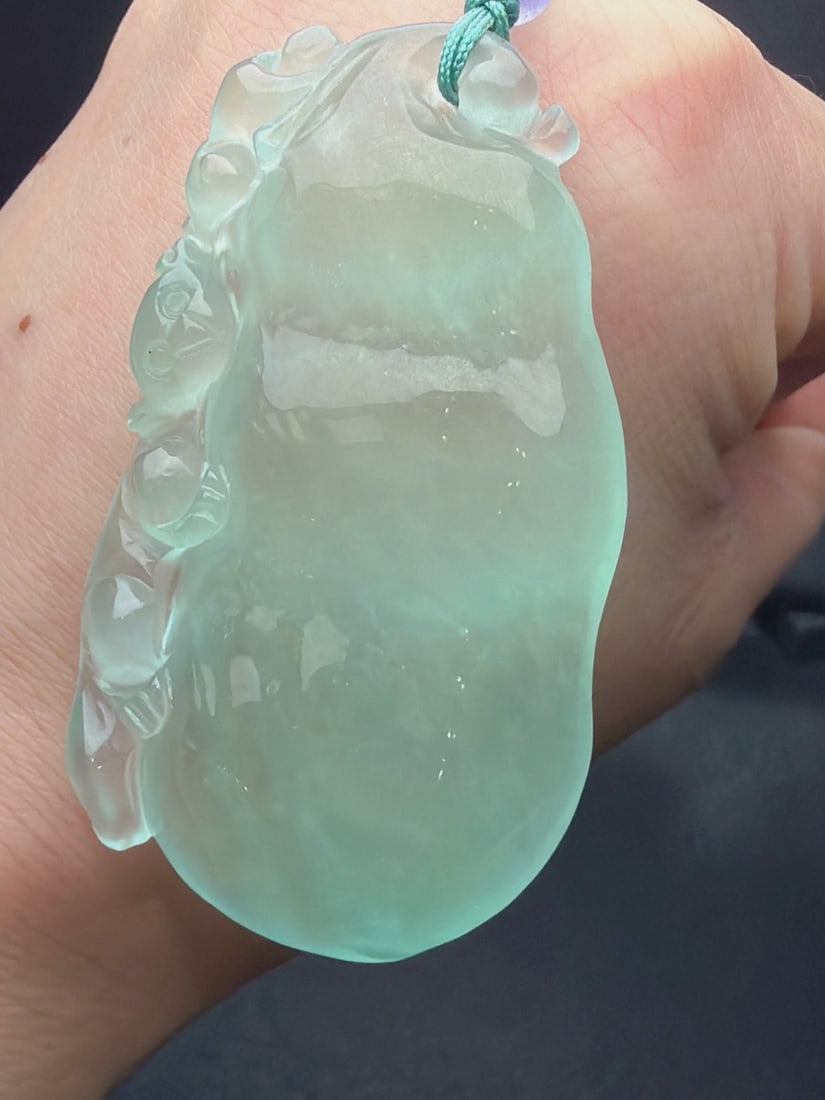 Jadeite Icy Green Fortune Bean String Bean: Jadeite of icy green color, resembling auspicious green beans or four-season beans, is icy and translucent, finely carved, thick and full, with top-notch texture and translucency. Provenance:Private c