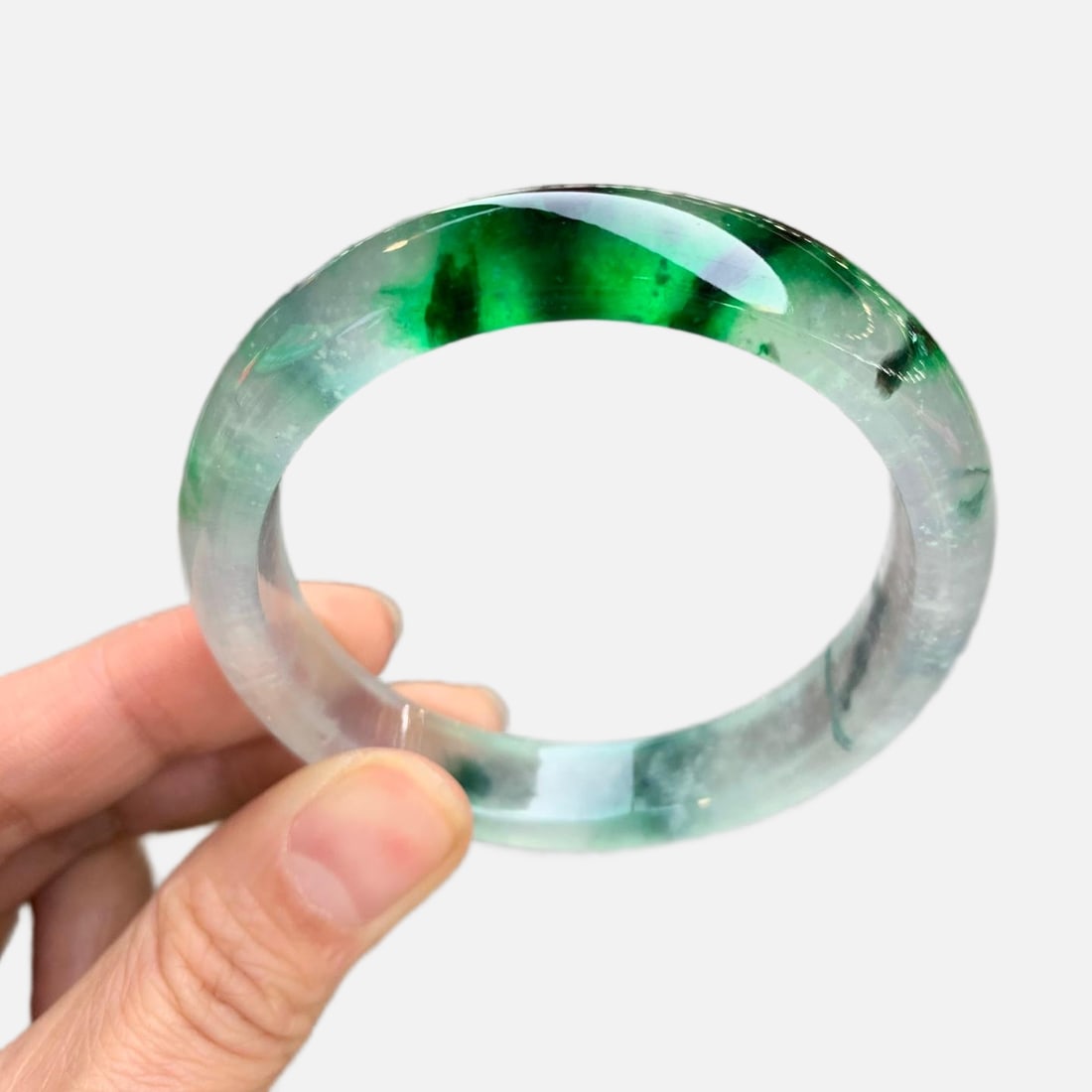 Burmese jadeite bangle, high-quality icy texture with floating green color, small and perfect. (1 of 12)