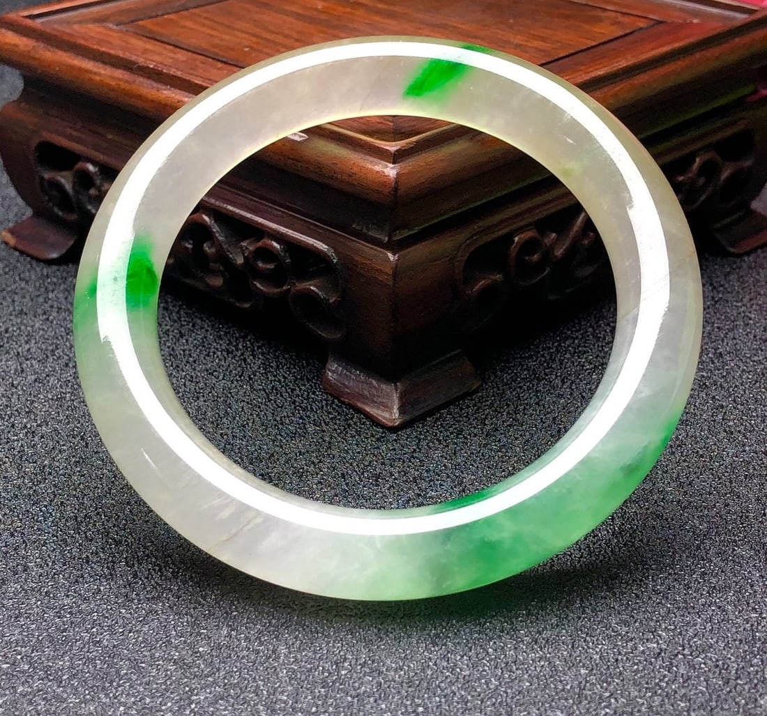 High-quality icy jadeite round bangle with floating patterns (1 of 9)