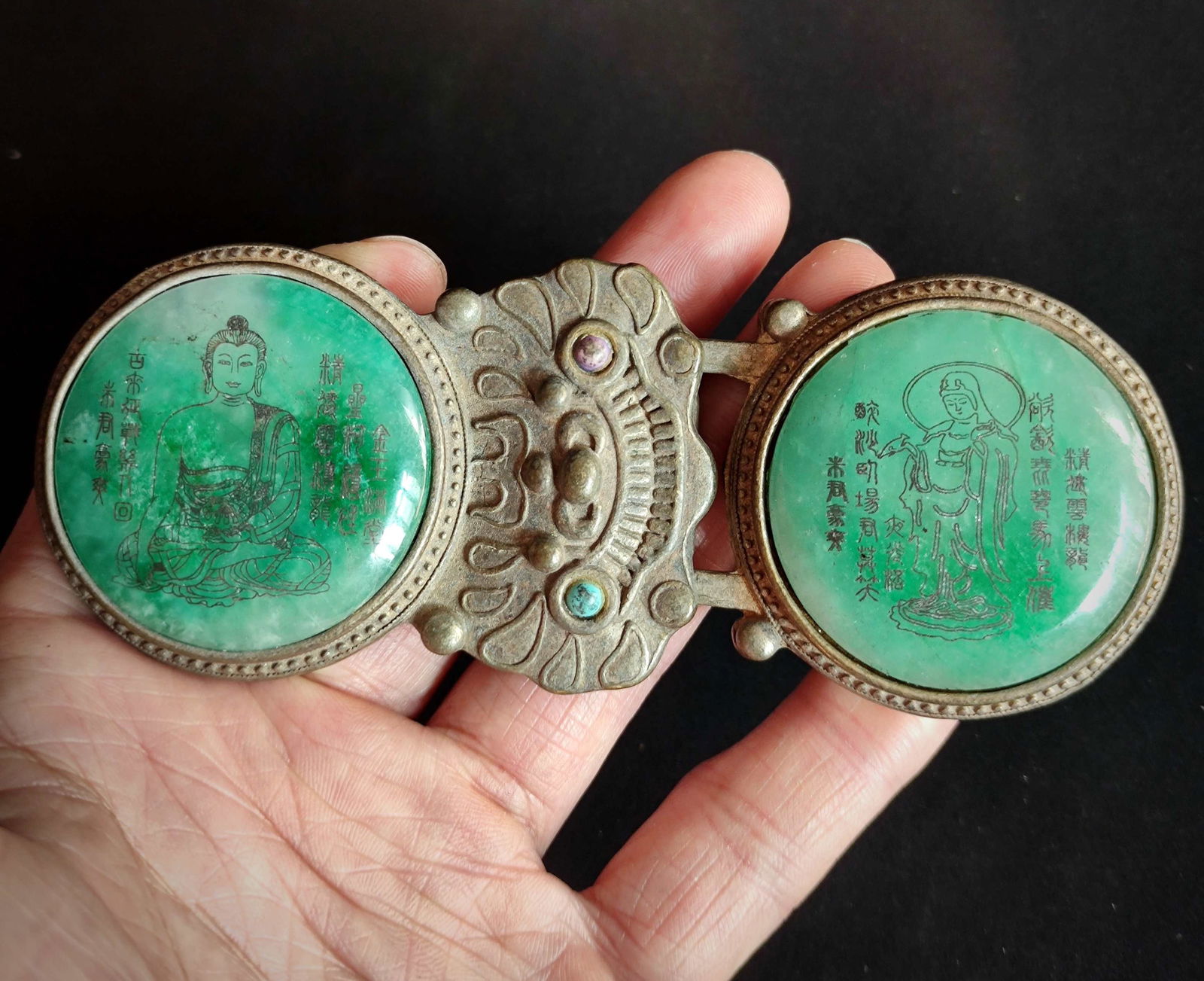 A set of Qing Dynasty silver belt buckles inlaid with jade. (1 of 8)