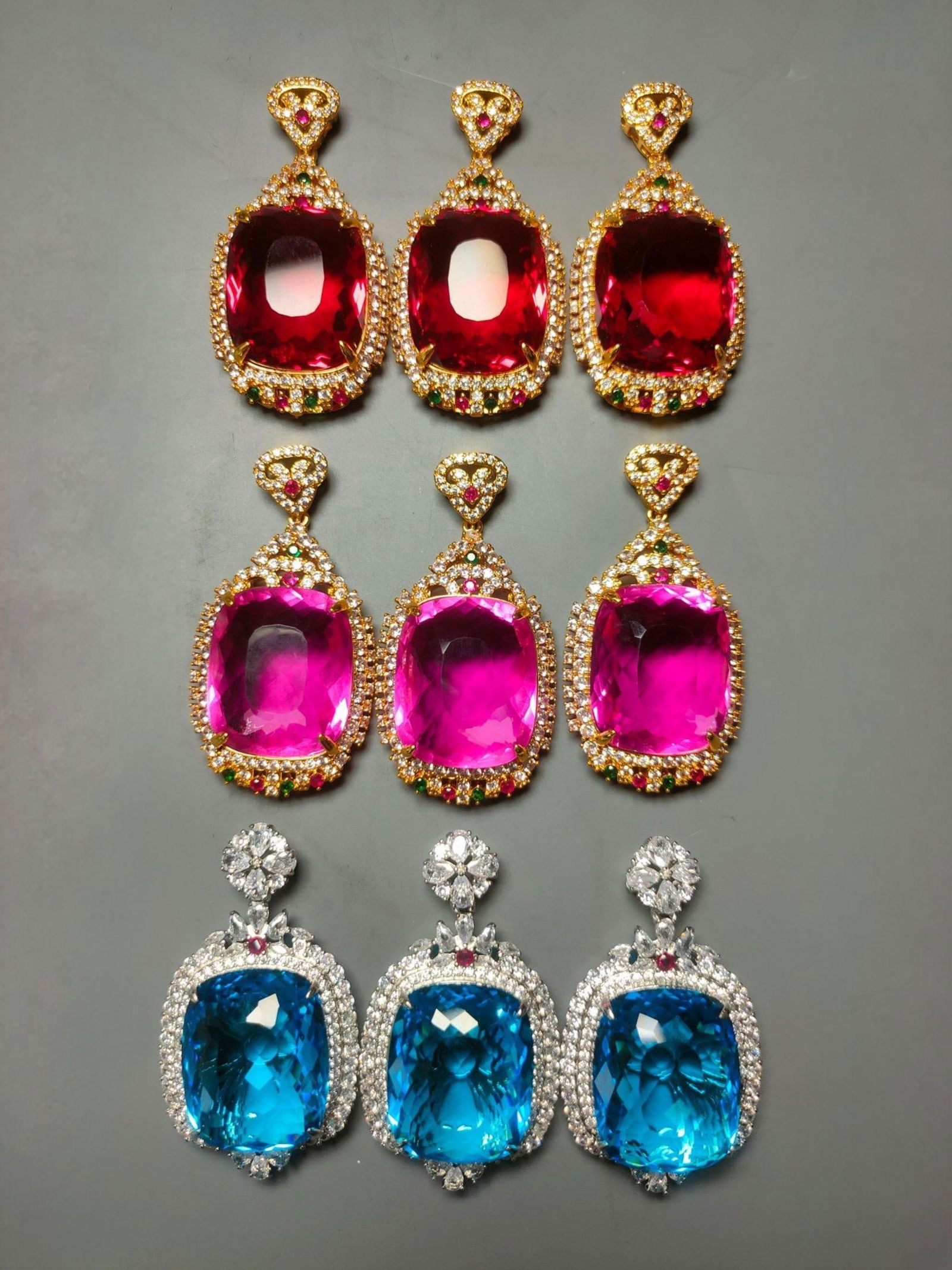 Silver and gilt silver pendant set with faceted gemstones: Silver and gilt silver pendant/ring with faceted gemstones. Size: 3 x 2.5 cm. Weight: 26g/28g. Provenance:Private collection , Boston, Massachusetts. Our dedicated team expertly handles both domestic