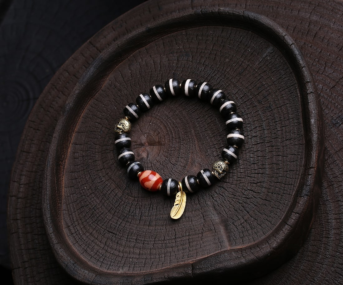 Old West Asian etched bead: These old West Asian etched beads have a particularly antique look, with fine weathering and delicate material. These beads are considered auspicious, symbolizing good fortune, happiness, and fulfillm