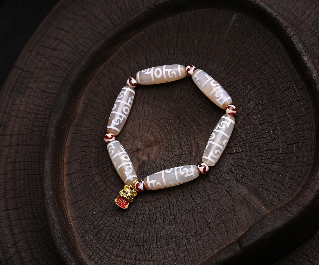Guru Rinpoche's ritual implements, dzi beads (1 of 6)