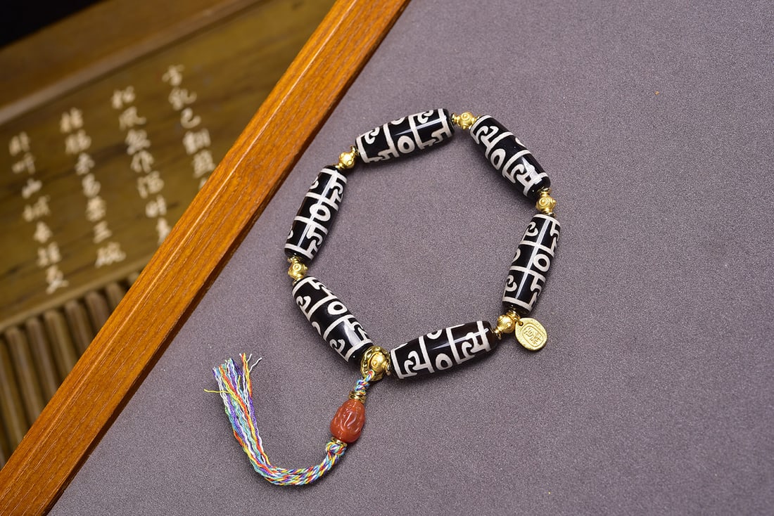 Guru Rinpoche's ritual implements, dzi beads (1 of 6)