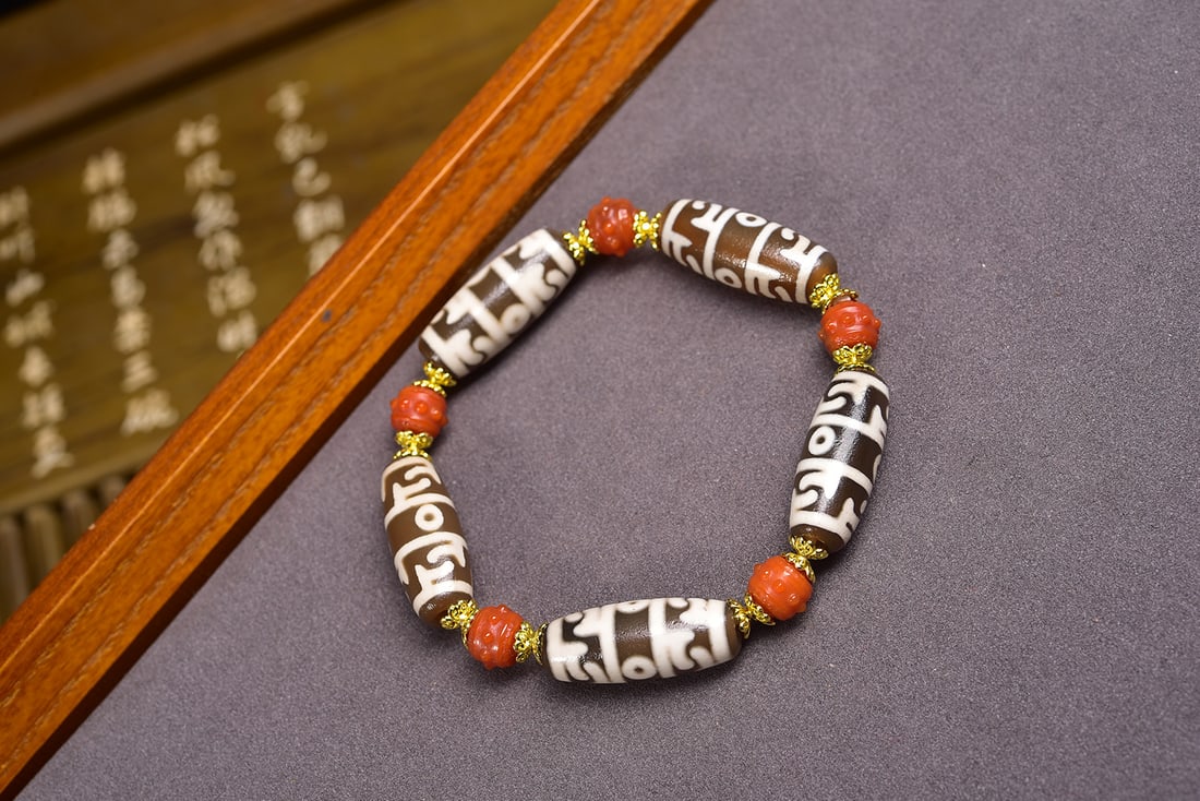 Guru Rinpoche's ritual implements, dzi beads (1 of 6)