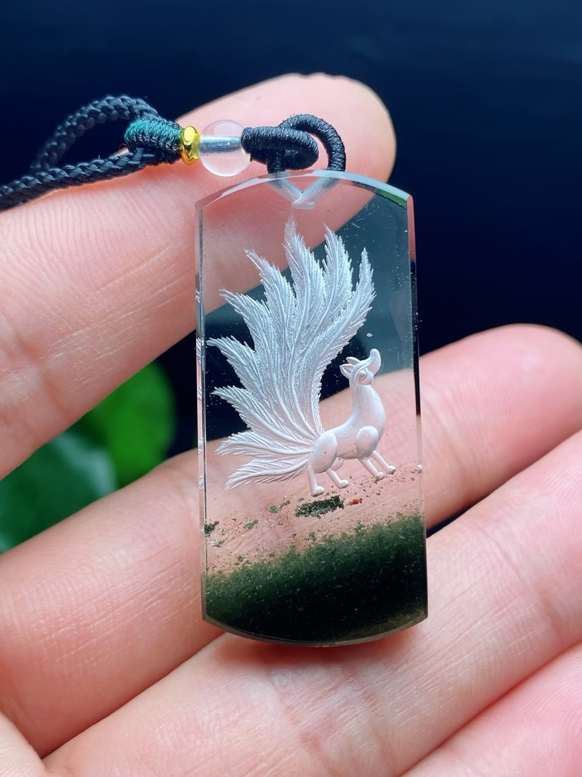 Natural Brazilian Green Phantom Nine-Tailed Fox Pendant: Natural Brazilian Green Phantom Nine-Tailed Fox Pendant. This lifelike green phantom nine-tailed fox pendant embodies the spirit of a sage. A thousand years of cultivation and waiting have led to this