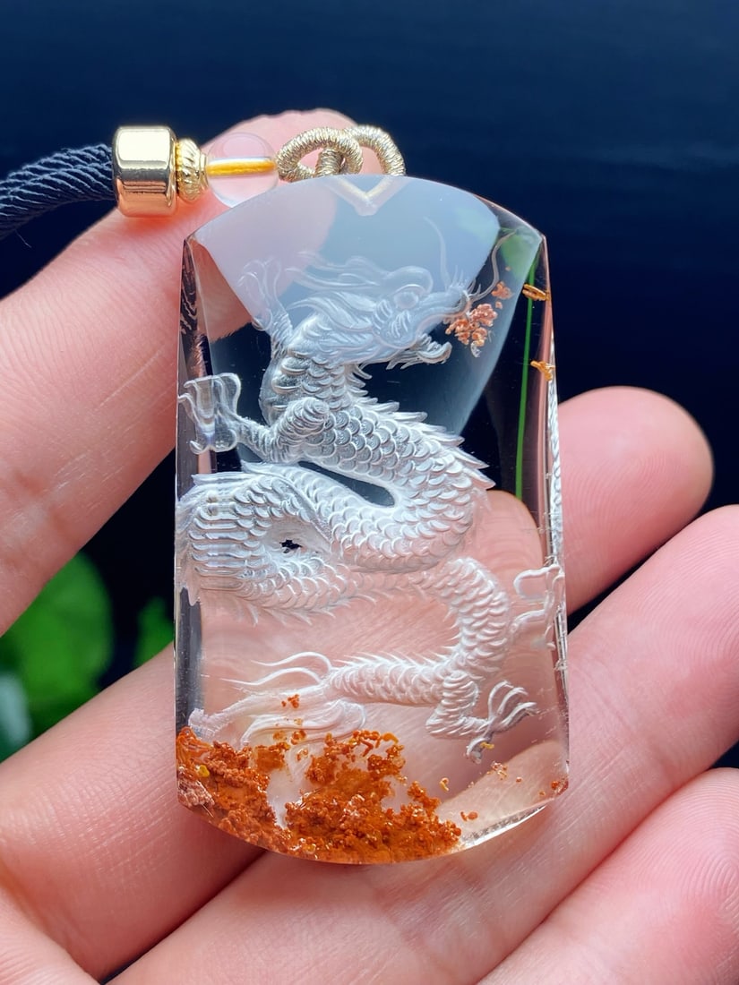 Top-quality natural rainbow phantom quartz pendant with an inner dragon carving on the front. (1 of 6)