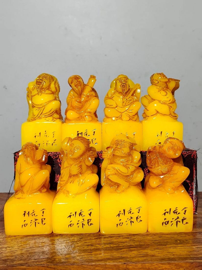 A hand-carved jade seal of the Eight Immortals Offering Auspiciousness from Tianhuang stone. (1 of 9)