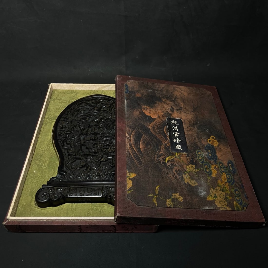 Agarwood carvings are placed inside a royal collection box. (1 of 9)