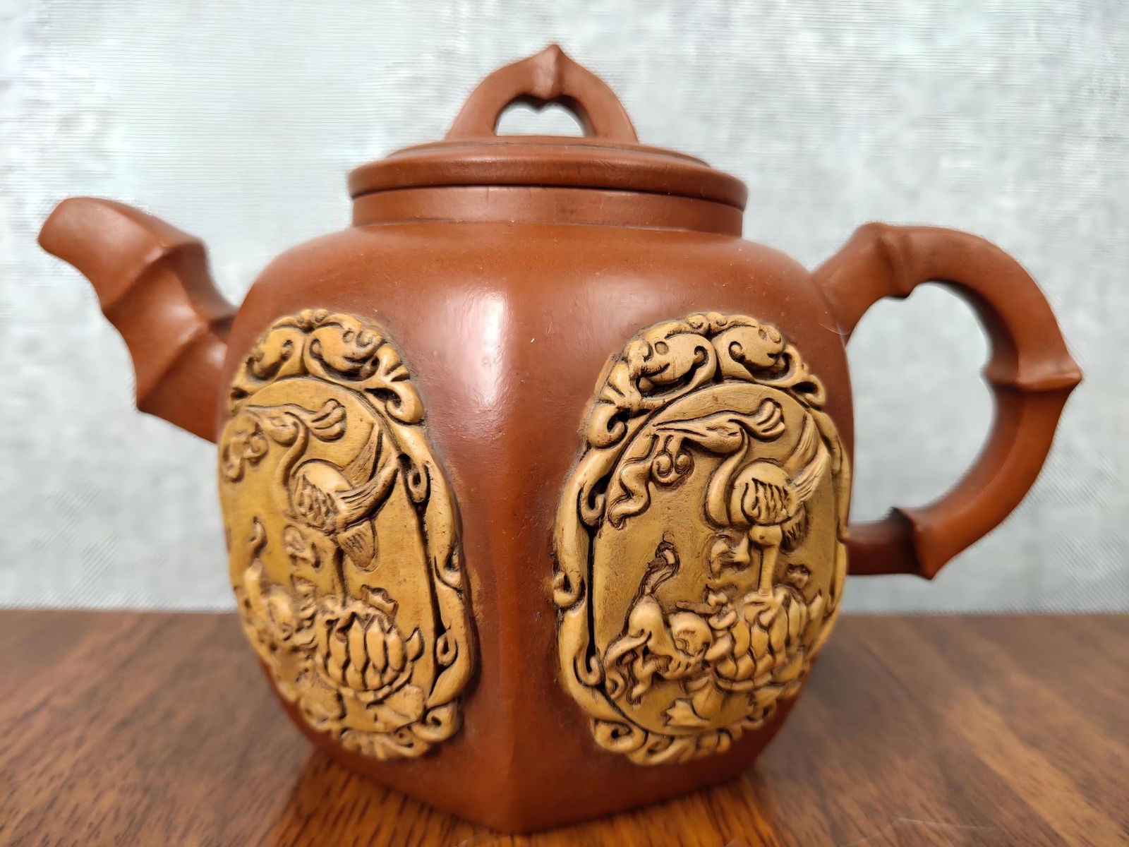 A collectible handcrafted Zisha teapot by a famous artist (1 of 9)