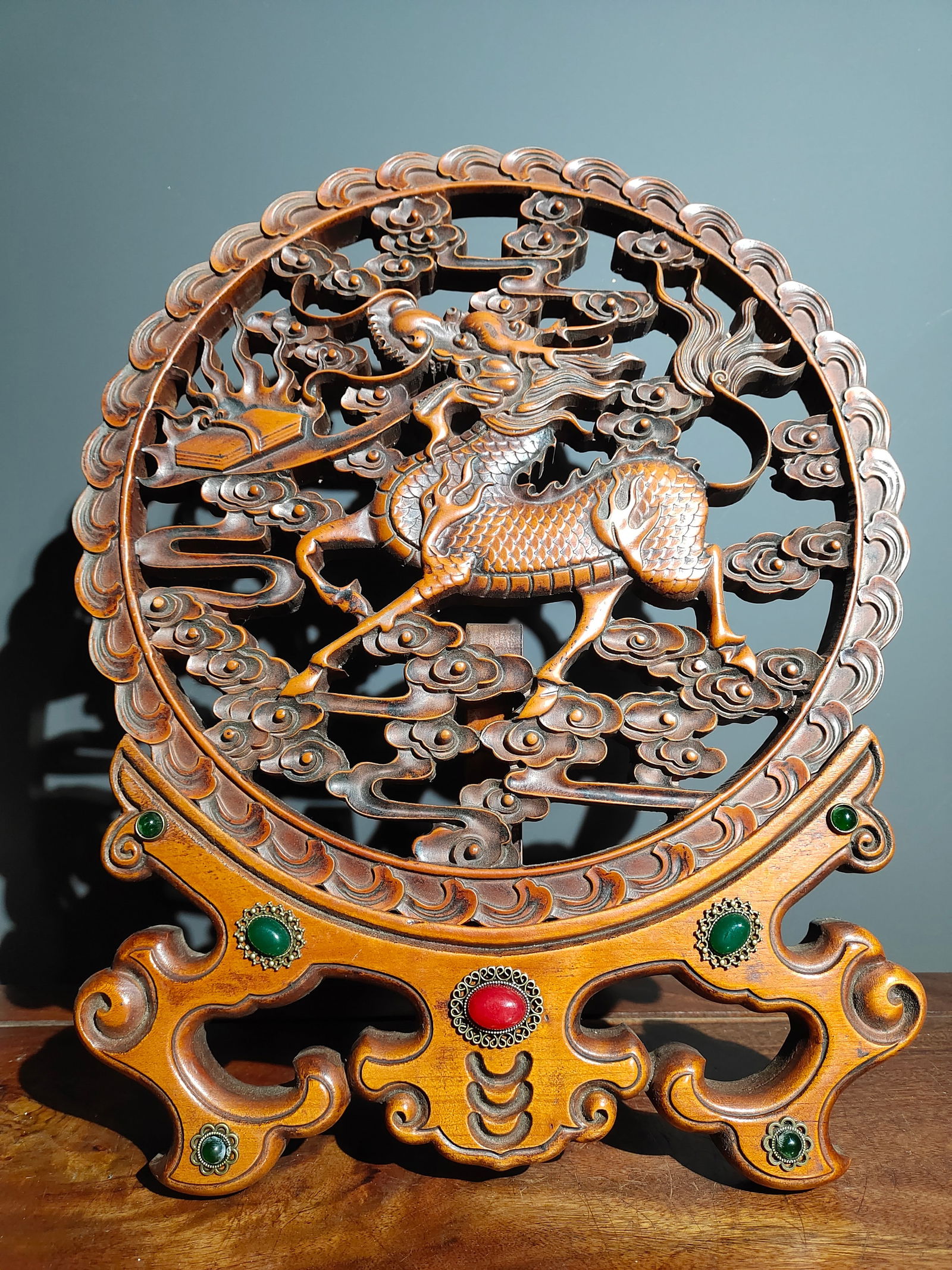 Old boxwood screen with gemstone inlay, featuring a kylin offering a book. (1 of 9)