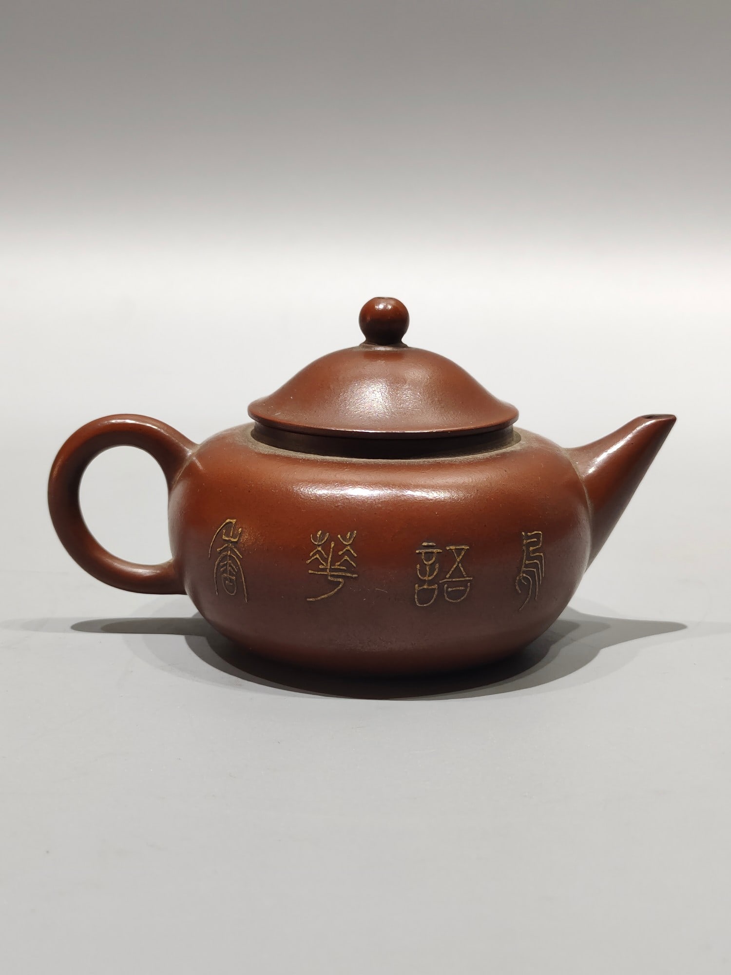 A rare, old-fashioned Zisha teapot with a printed "Fu Ji" mark on the bottom. (1 of 7)