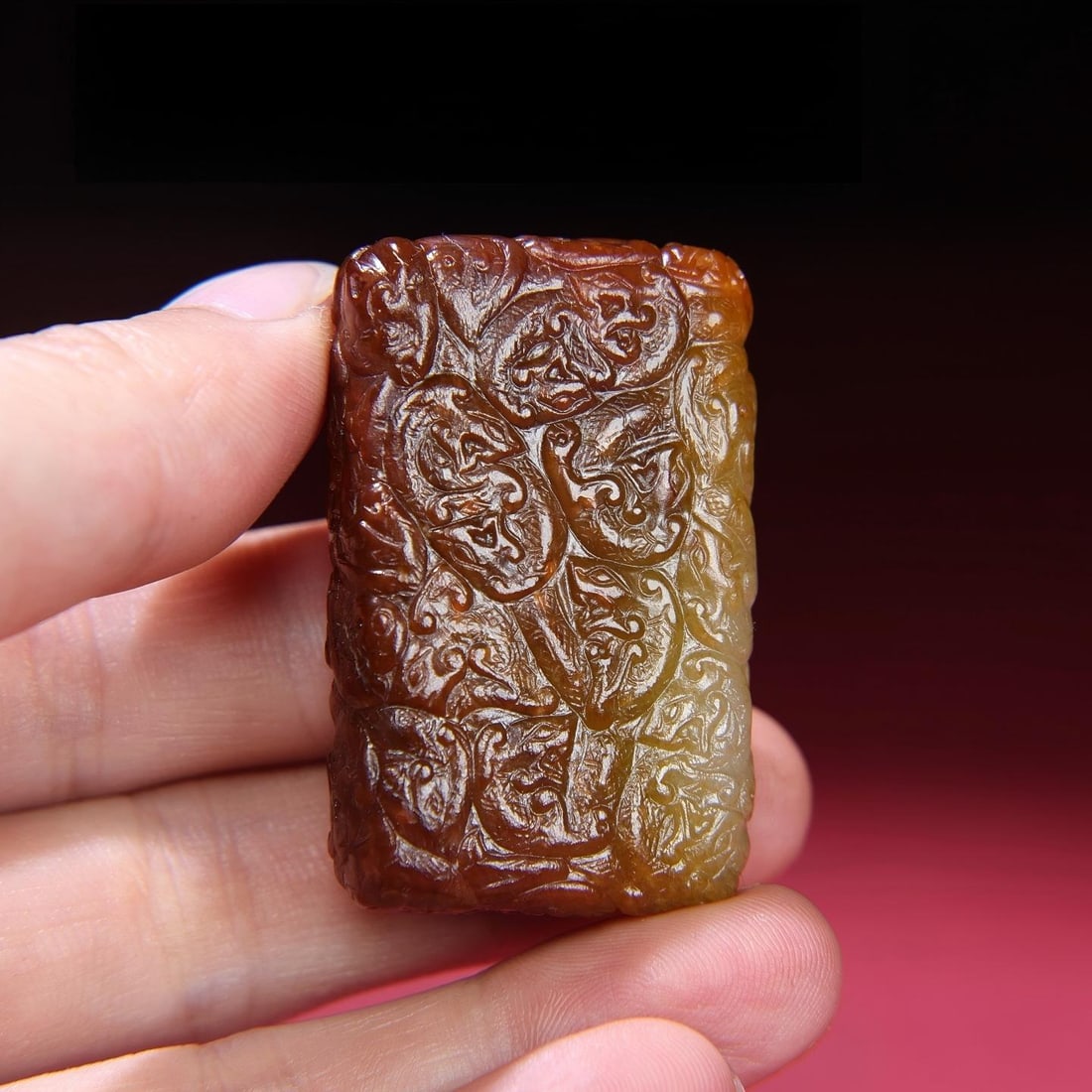 Exquisite antique collection, a small plaque made of Hetian jade with inlaid silk-like patterns and: A fine, formerly owned piece of Hetian jade, featuring a large, deeply patinated dragon design with a rich, intricate patina. The craftsmanship is exquisite, with sharp, precise carving. A rare and ex