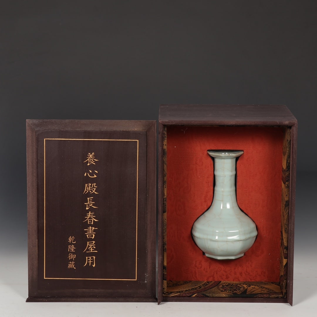 Formerly in the collection of a Southern Song Dynasty Longquan official kiln octagonal vase with (1 of 9)