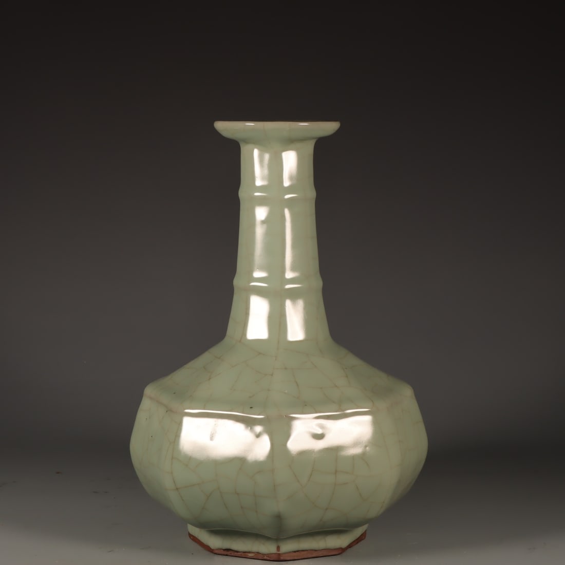 Formerly in the collection of a Song Dynasty official kiln celadon octagonal vase with string (1 of 9)