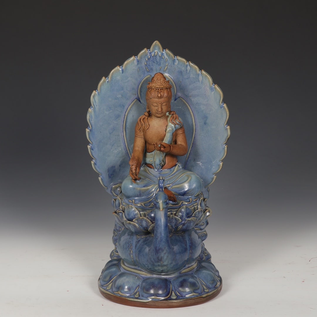 Formerly in the collection of a Song Dynasty Jun ware grape-purple glazed peacock king seated statue (1 of 9)
