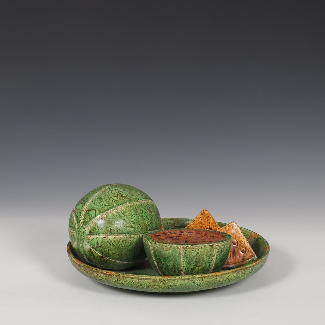 Formerly in the collection of a Tang Dynasty Gongxian kiln marbled yellow-green glazed fruit plate (1 of 9)
