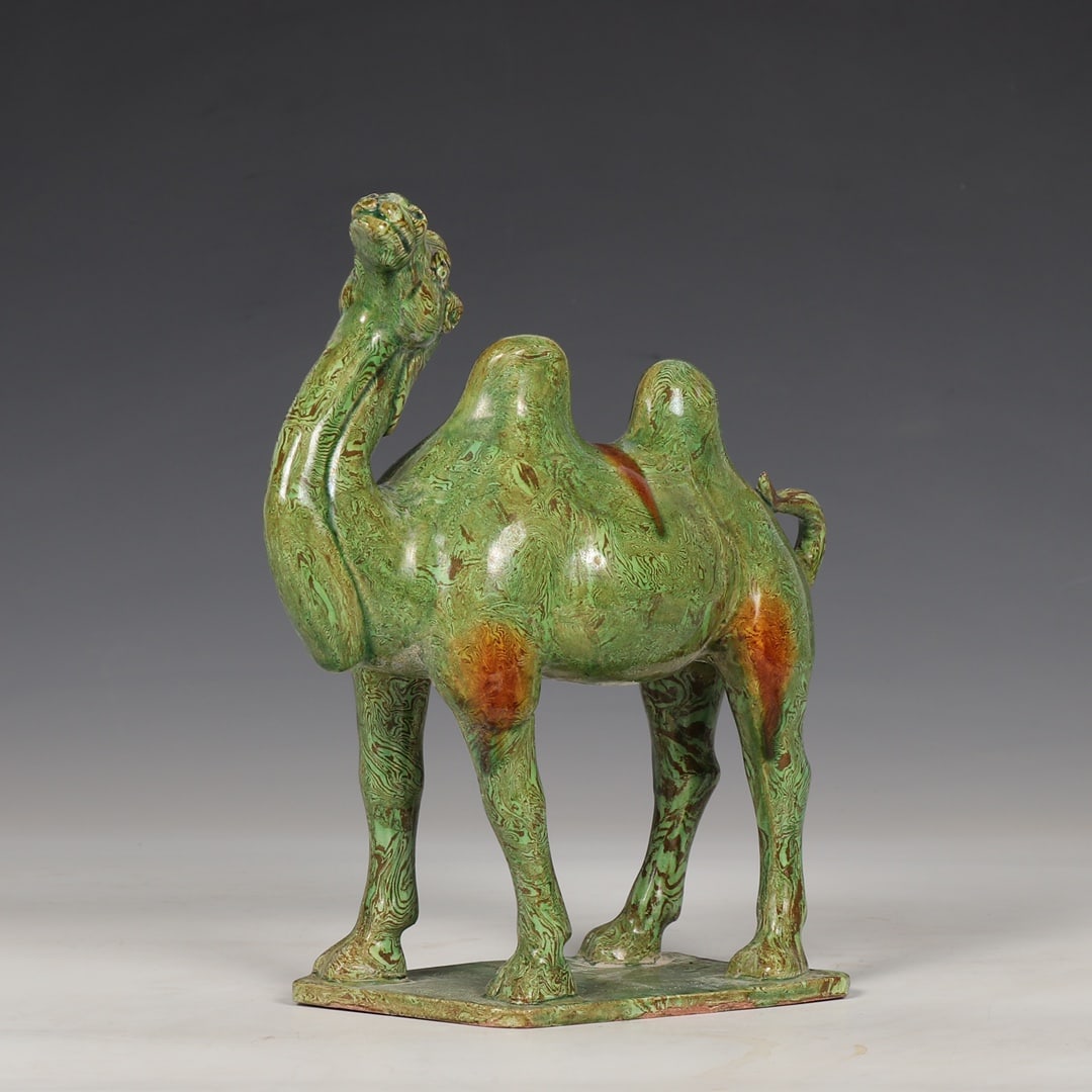 A Tang Dynasty Gongxian kiln marbled green-glazed camel ornament. (1 of 9)