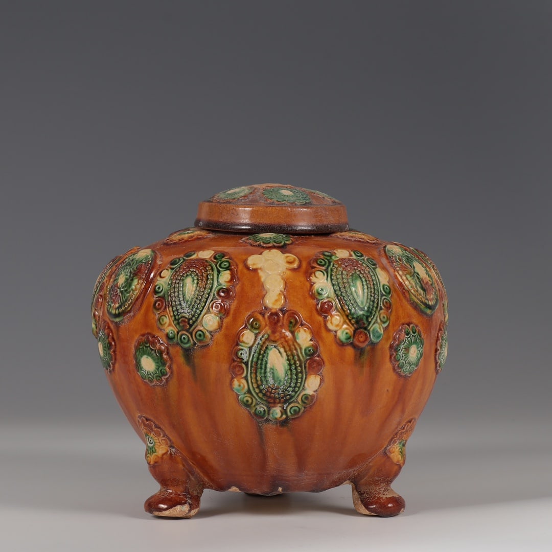 Formerly in the collection of Tang Dynasty tri-color glazed pottery jar with applied plastic (1 of 9)