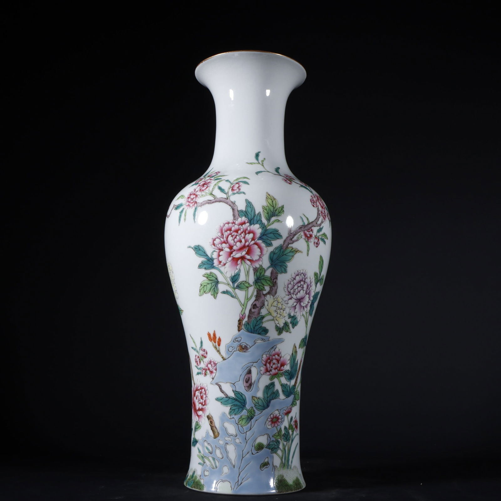 A Qing Dynasty Qianlong period famille rose vase with floral and bird design. (1 of 9)