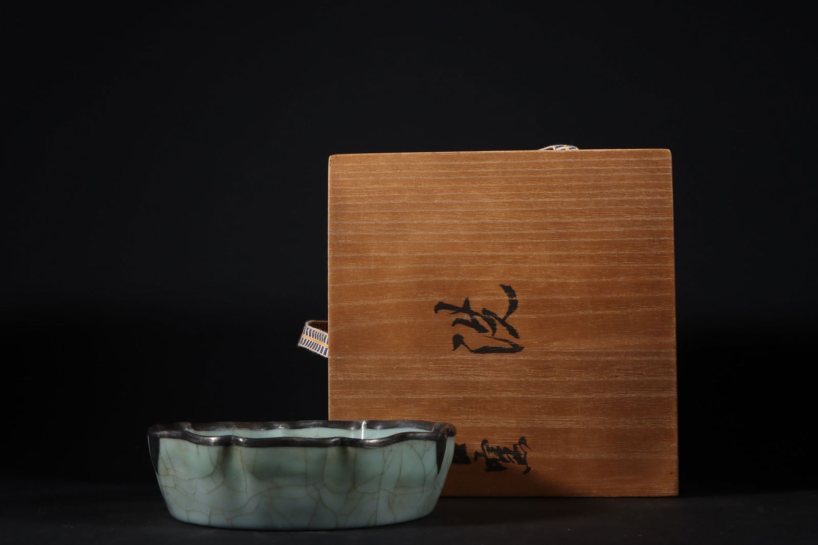 Formerly in the collection of a Song Dynasty official kiln celadon-glazed washer with silver clasp (1 of 9)