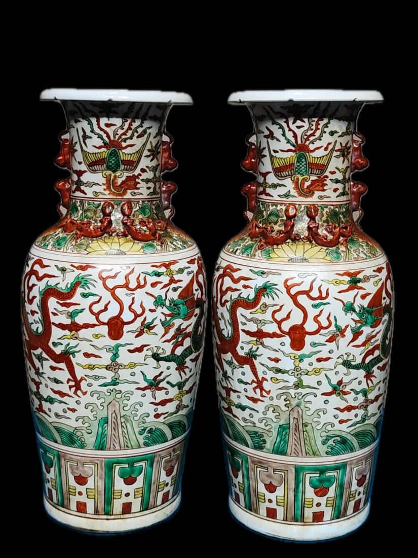 A pair of exquisitely crafted, fully decorated polychrome porcelain vases with dragon and phoenix (1 of 9)