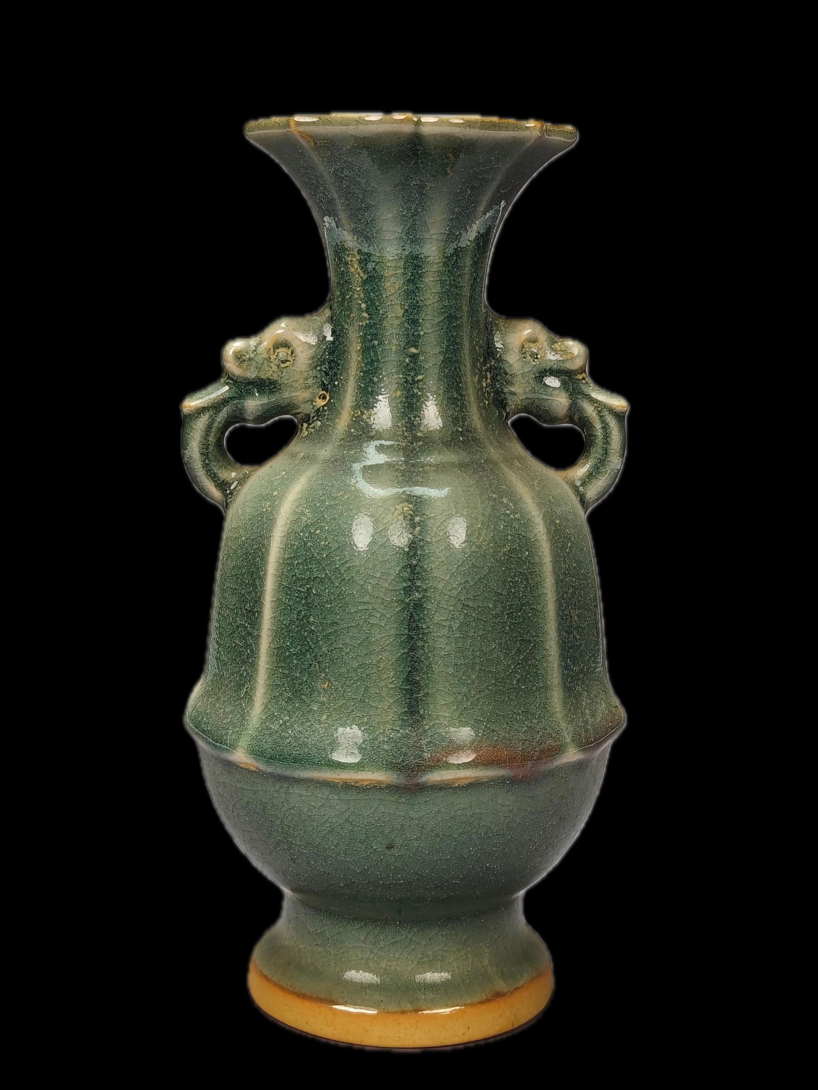 A finely crafted Longquan celadon melon-shaped vase with crackled glaze. (1 of 9)