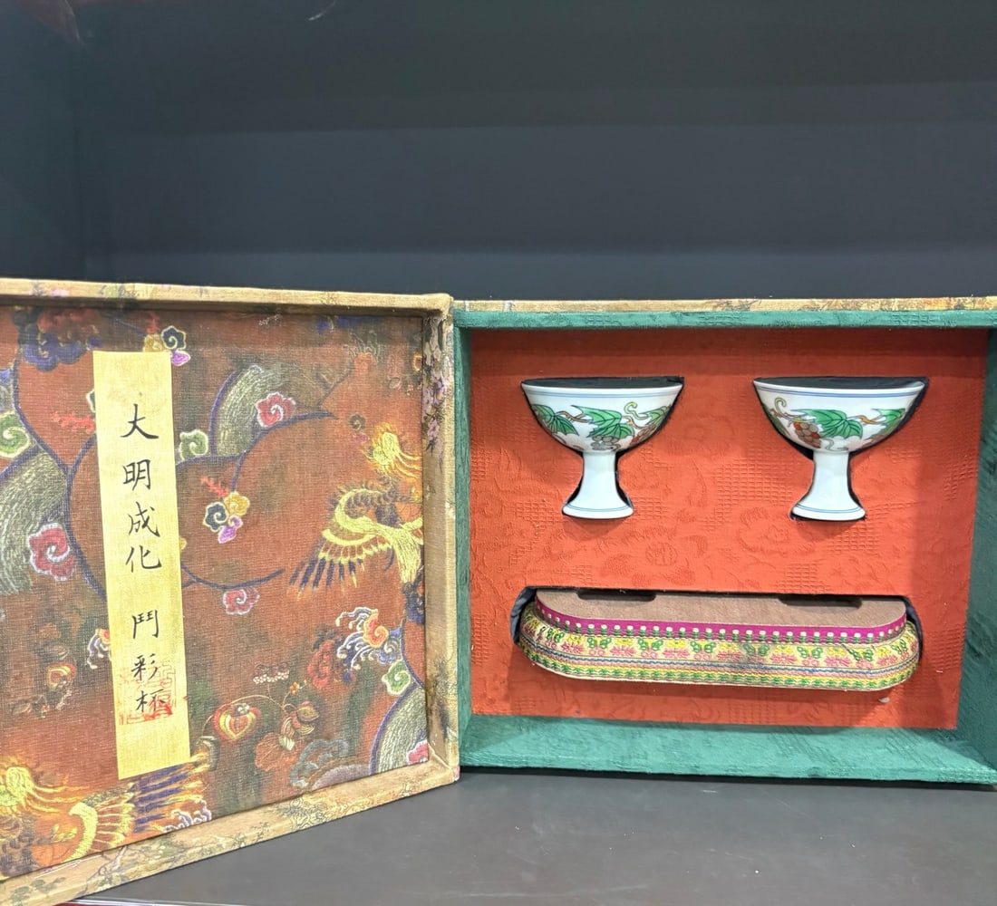 Chenghua Doucai Grape Pattern Stem Cup (Ming Dynasty): A Ming Dynasty Chenghua period doucai (enamel overglaze enamel) stemmed cup with grape design. Dimensions: Height 6.8cm, Mouth diameter 8.3cm. Provenance:Private collection from a professor in Univers