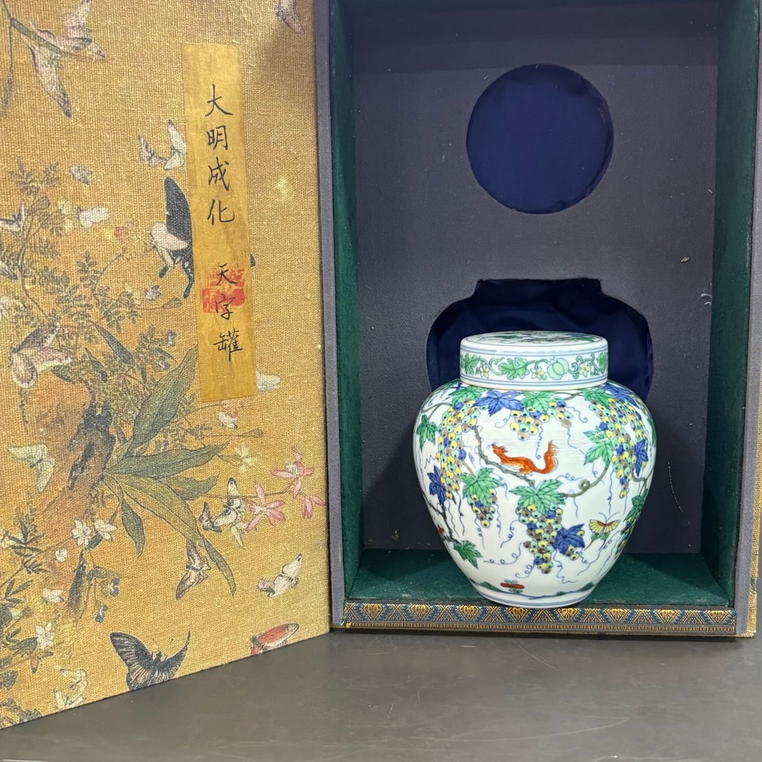 Ming Chenghua Doucai Squirrel and Grape Pattern Tianzi Jar: A Ming Dynasty Chenghua period doucai (enamel overglaze enamel) jar with squirrel and grape design, measuring 14cm in height and 13.5cm in width. Provenance:Private collection from a professor in Univ