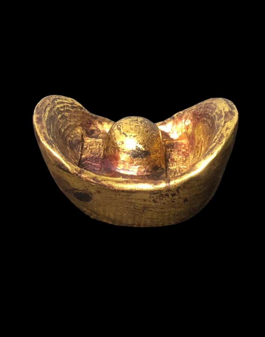 Solid gilded gold ingots made during the Kangxi reign of the Qing Dynasty (1 of 8)