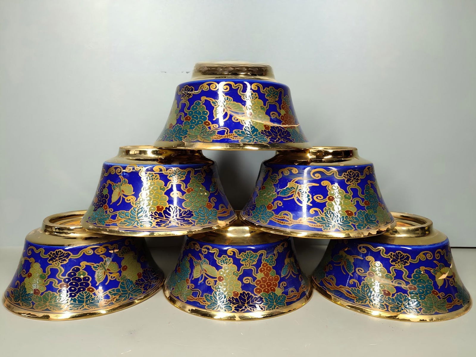 A treasured gilt grape-patterned tea cup made during the Xuande period of the Ming Dynasty.: A collection of six gilt-gilt grape-patterned tea cups, each 10.5 x 4.6 cm, made during the Xuande reign of the Ming Dynasty. Provenance:Private collection, Houston, Texas. Our dedicated team expertly
