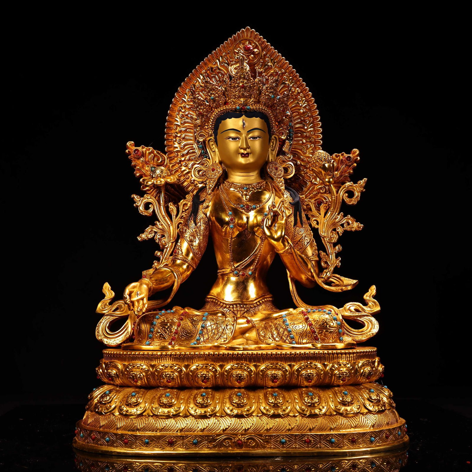 A Nepalese handcrafted, high-relief, gilded Tibetan White Tara Buddha statue. (1 of 9)