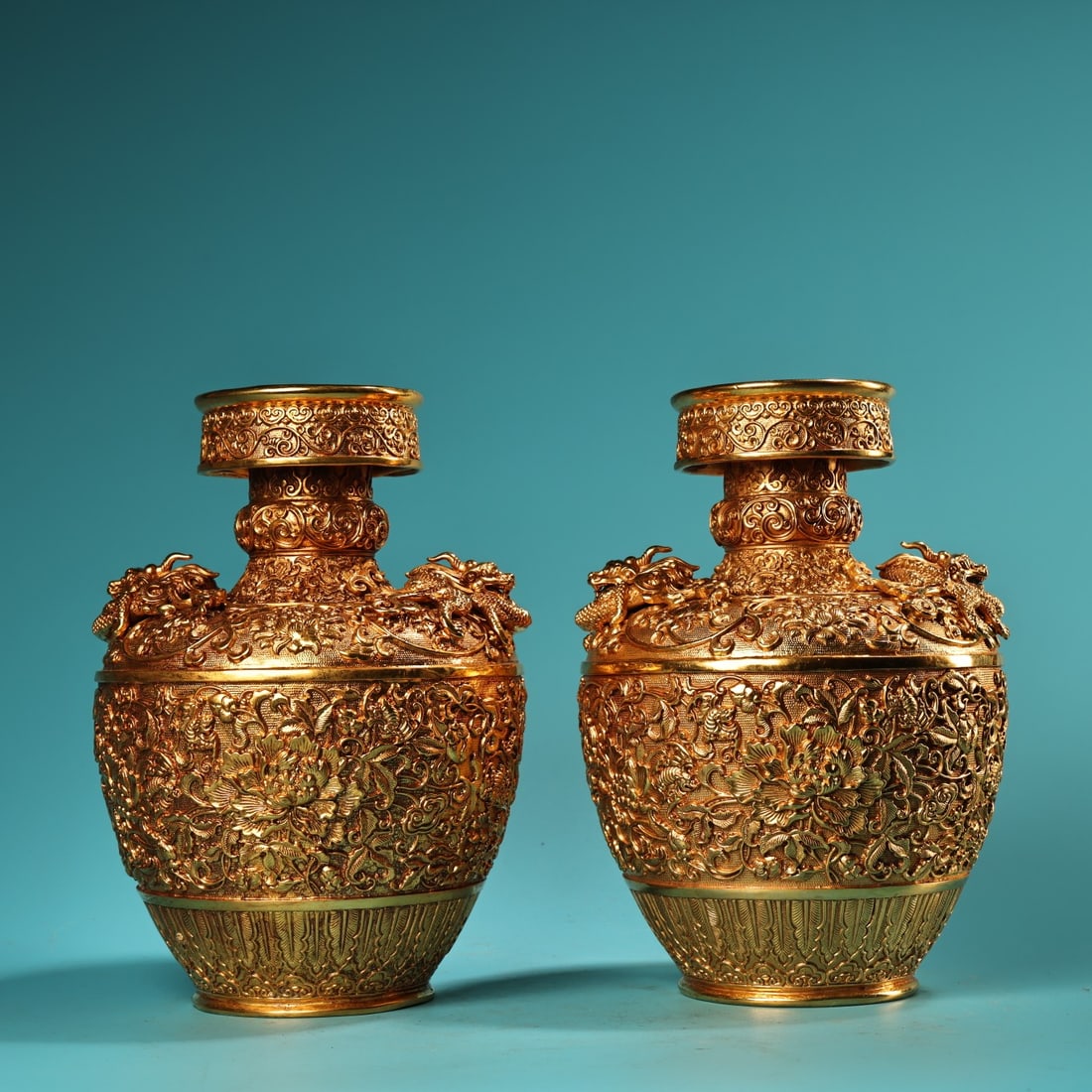 A pair of rare, high-relief, gilded bronze vases with dragon-shaped handles. (1 of 9)