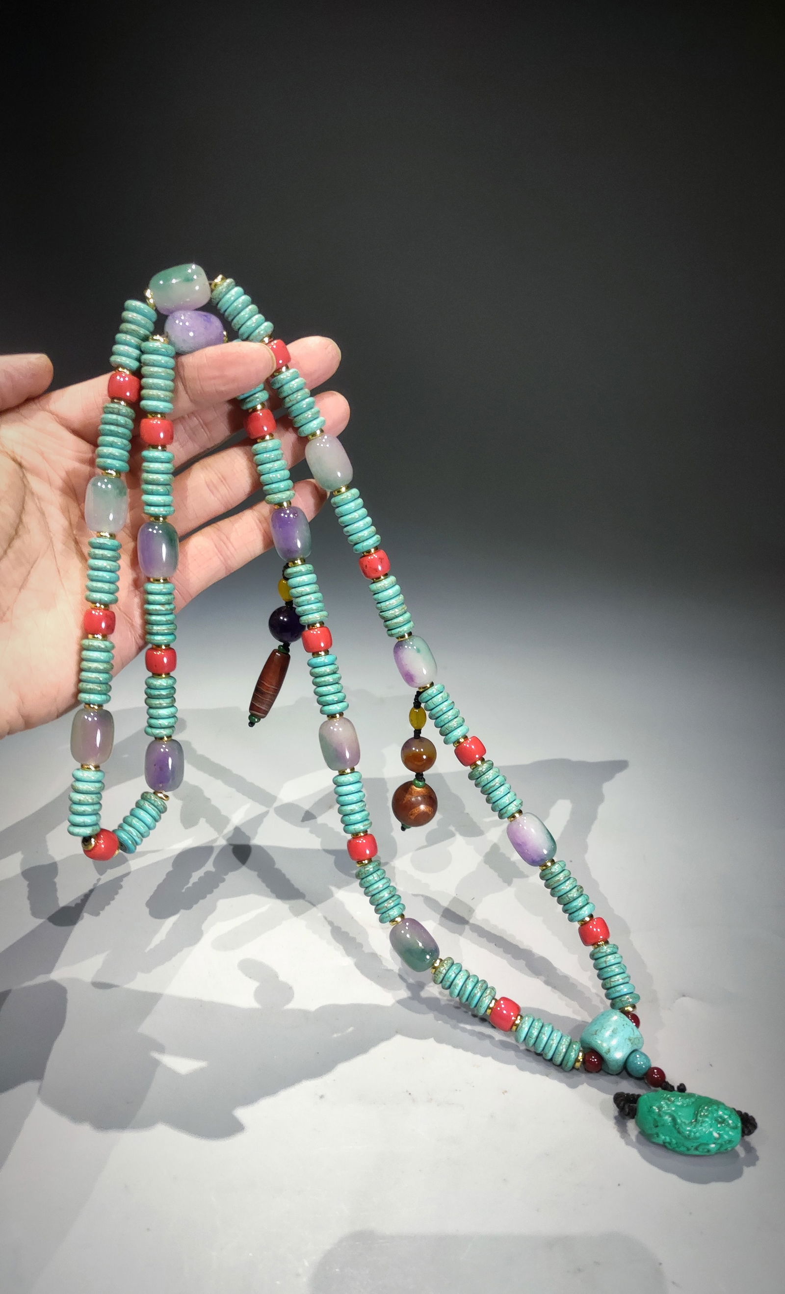 Qing Dynasty turquoise court beads, jadeite barrel beads and spacers, and dzi beads as accessories.: Qing Dynasty turquoise court beads, jadeite barrel beads and spacers, and dzi beads as accessories. Provenance:Private collection from a professor in Massachusetts Institute of Technology. Our dedicat