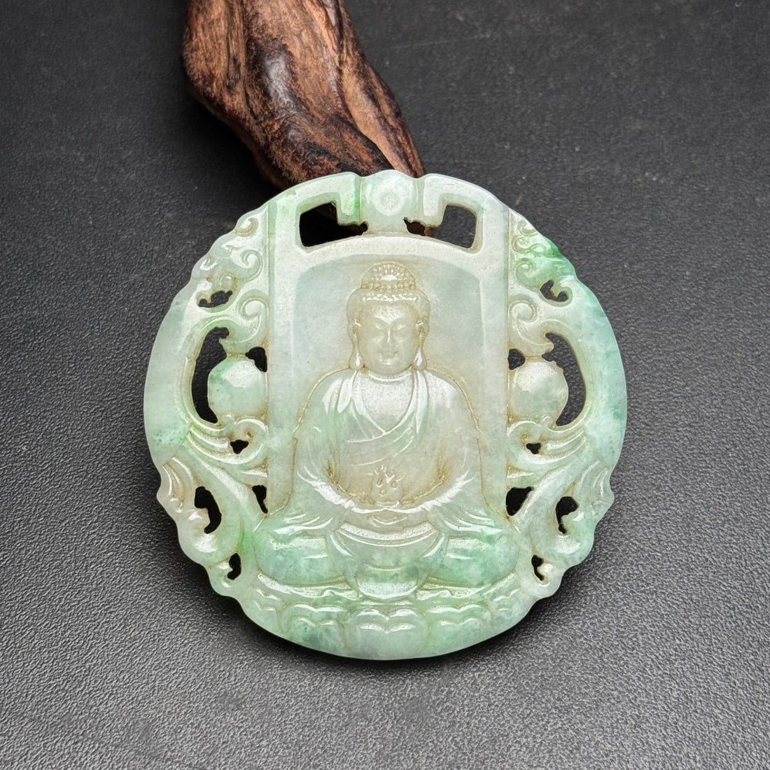 Formerly owned jade pendant, carved with Vairocana Buddha (1 of 9)