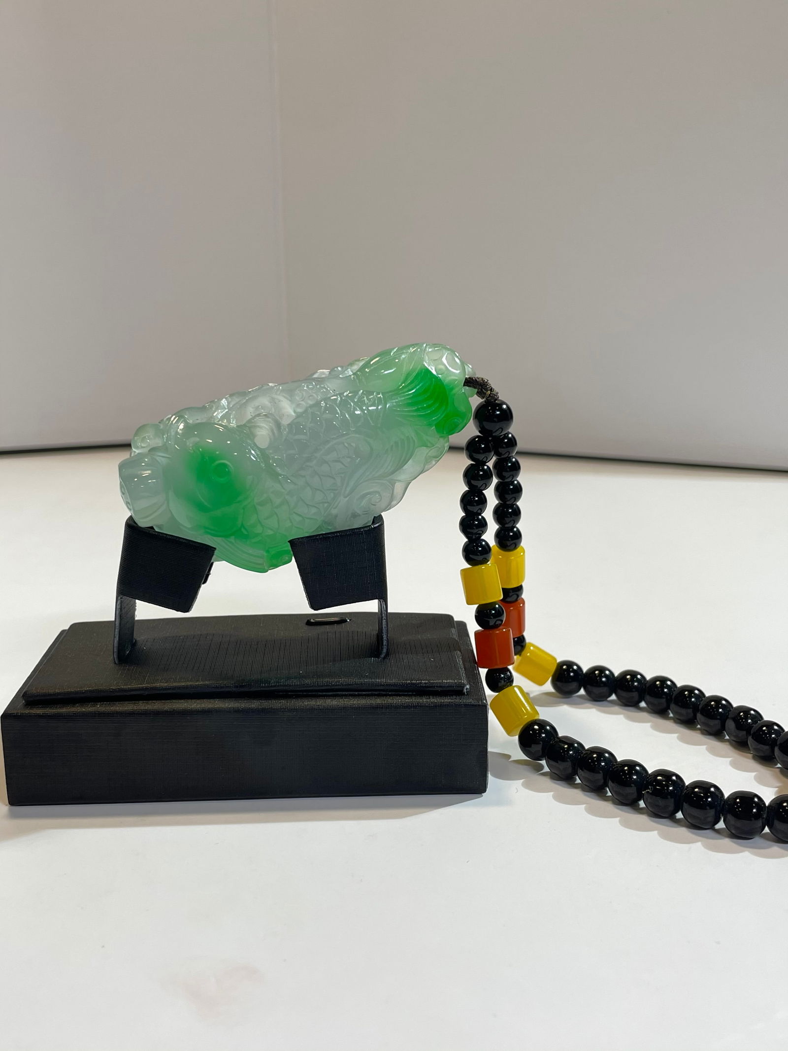 High-grade icy jadeite with floating flowers, "Abundant Harvest Year After Year" pendant: High-grade icy jadeite with floating flowers, "Abundant Harvest Year After Year" pendant Provenance:Private collection, Cliffside Park, New Jersey. Our dedicated team expertly handles both domestic an