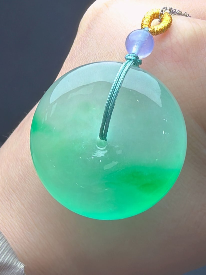 Jadeite Icy Green Floating Green Safety Buckle Bread Buckle: Jadeite icy green floating green safety buckle/bread buckle, icy and translucent, finely carved, thick and full, top-quality jadeite. Provenance:Private collection of the retired lawyer Mr.Henry, Chel