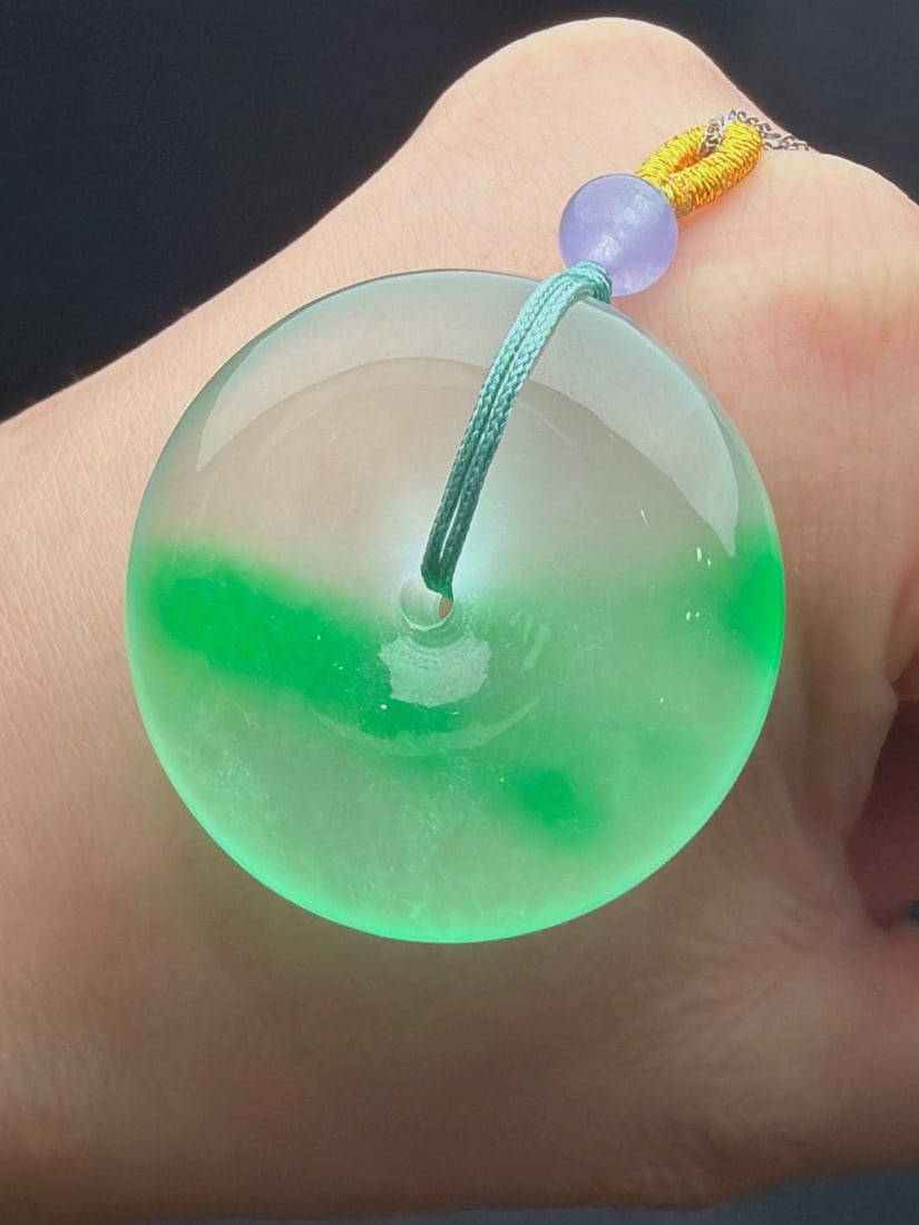 Jadeite Icy Green Floating Green Safety Buckle Bread Buckle: Jadeite icy green floating green safety buckle/bread buckle, icy and translucent, finely carved, thick and full, top-quality jadeite. Provenance:Private collection of the retired lawyer Mr.Henry, Chel