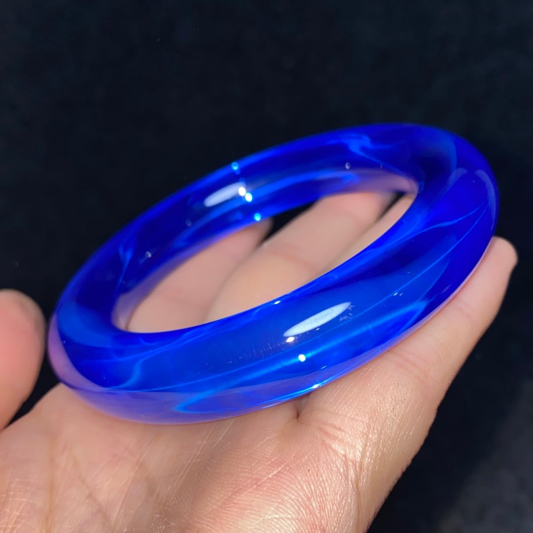 Exquisite collectible high-hardness aurora six-pointed star gemstone bracelet: Exquisite collectible high-hardness aurora six-pointed star gemstone bracelet. Dimensions: Inner diameter 60 mm, width 15 mm. Provenance:Private collection from a professor in Harvard University. Our