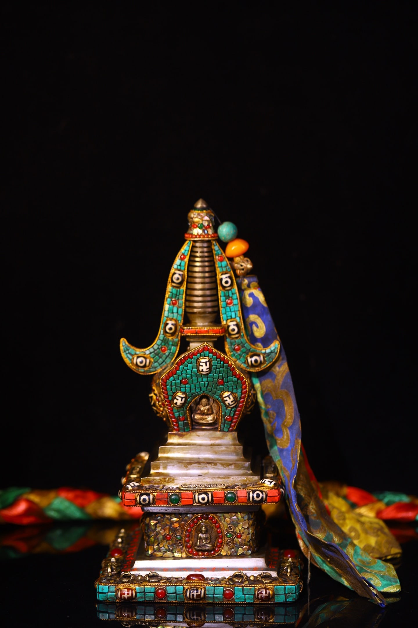 Tibetan-style stupa made entirely by hand, crafted from meteorite iron, and inlaid with dzi beads.: This Tibetan-style meteorite stupa, handcrafted and inlaid with dzi beads, is 31 cm high, 15 cm wide, and weighs approximately 4300g. Provenance:Private collection from a professor in Massachusetts In