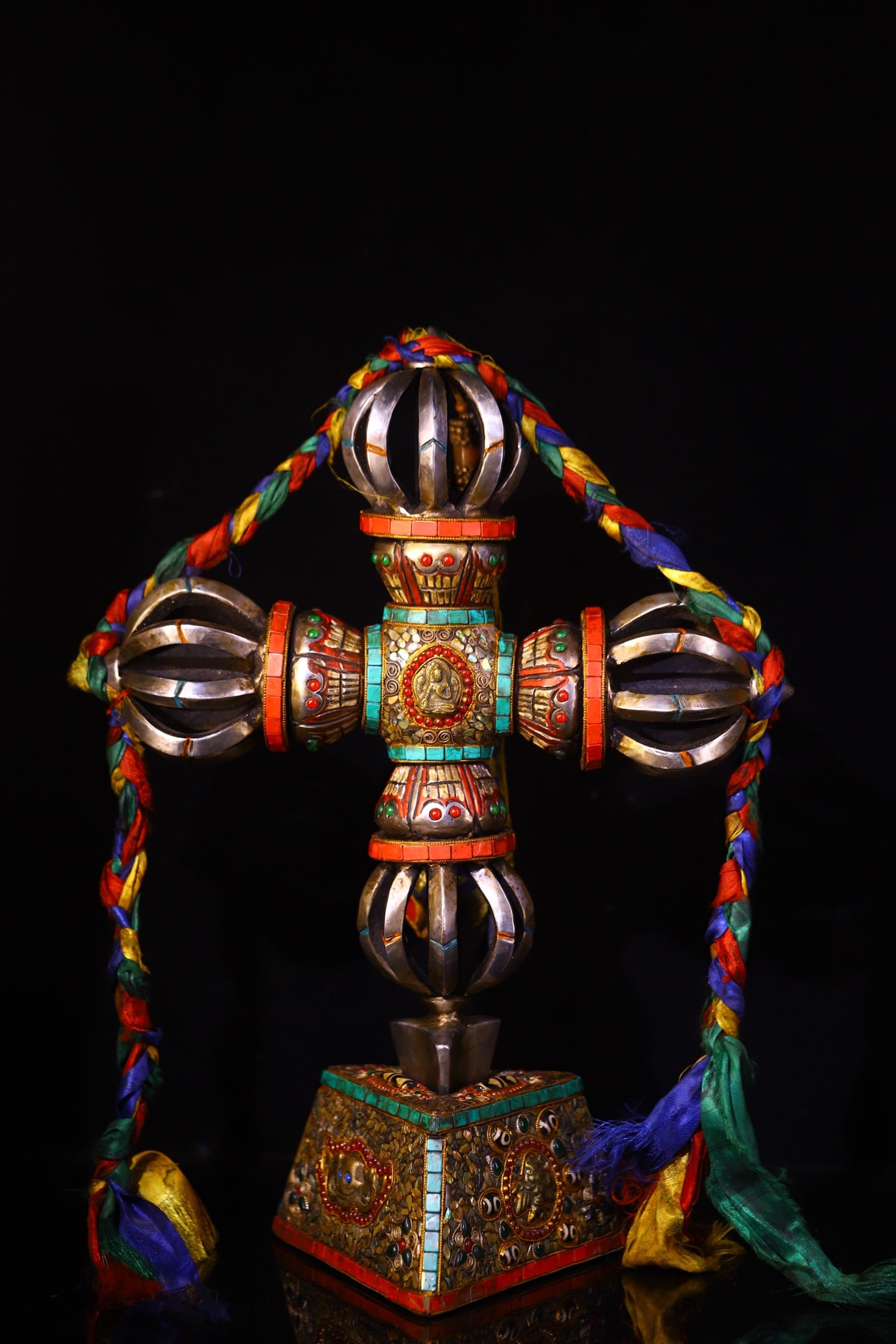 Tektite, hand-hammered, engraved, and inlaid with gemstones, dzi beads, and other ancient ritual: This dzi bead ritual implement is handcrafted, hammered, engraved, painted, and inlaid with gemstones. It is 54 cm high, 33 cm wide, and weighs approximately 7500 g. Provenance:Private collection from