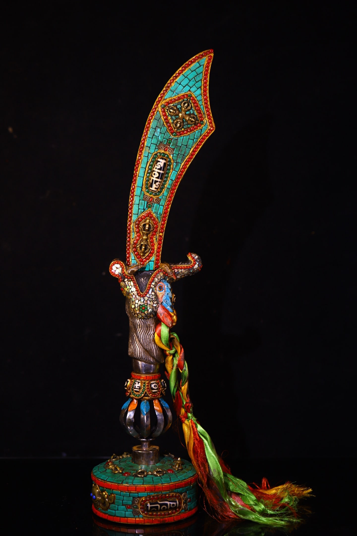 Tibetan-style reclaimed meteorite iron, handcrafted and inlaid with jewels and gemstones, is a type (1 of 9)