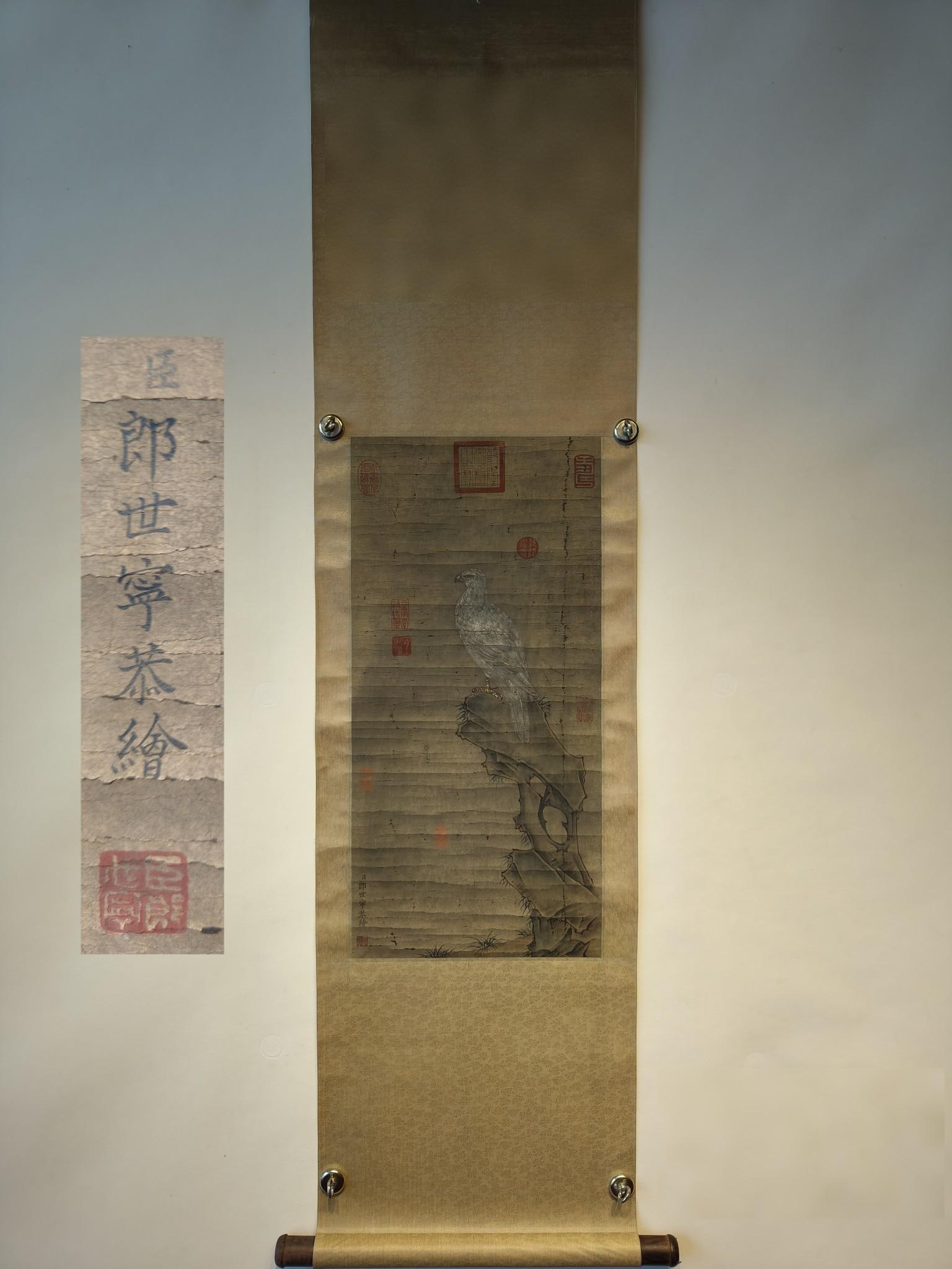 Lang Shining's Fine Hanging Scroll of Eagle on Paper and Silk Mounting: A fine hanging scroll of eagle painting by Lang Shining, a court painter of the Qing Dynasty, mounted on silk and printed on paper. Total length 167 x 41 cm, painting area 68 x 32 cm. Provenance:Mr.Jo