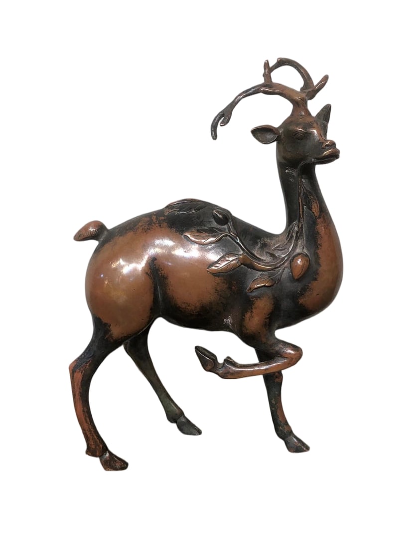A bronze high-relief sculpture of a deer symbolizing good fortune. (1 of 8)
